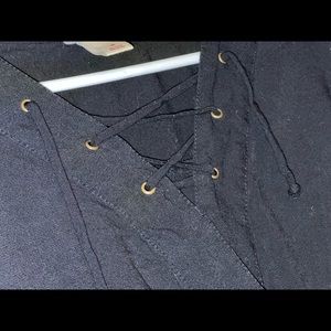 Black long sleeve shirt with lacing in front